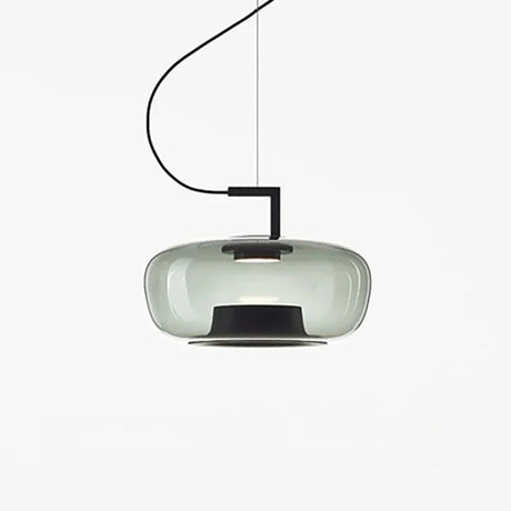 Wide green glass shade seen from the side against white