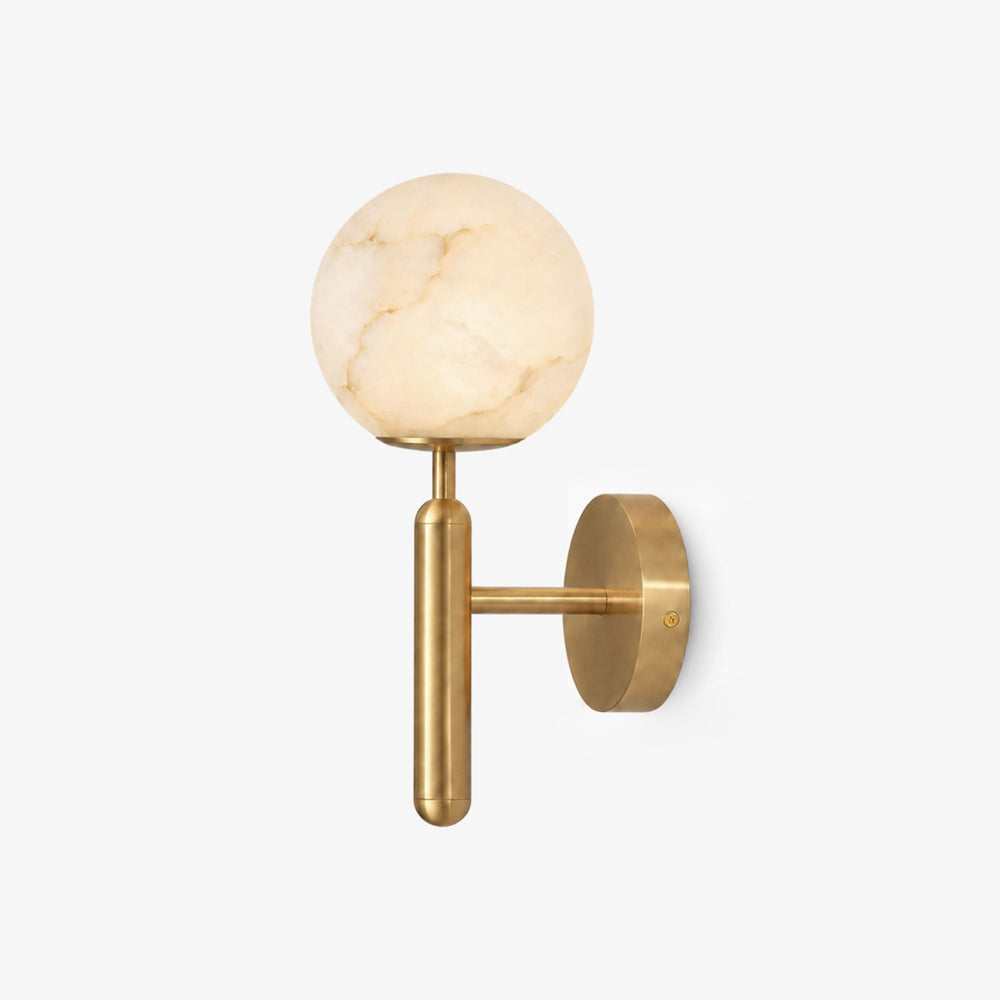 Carved stone globe on a slim gold T shaped stem with a round wall plate