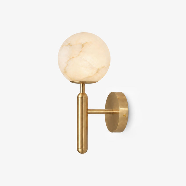 Carved stone globe on a slim gold T shaped stem with a round wall plate