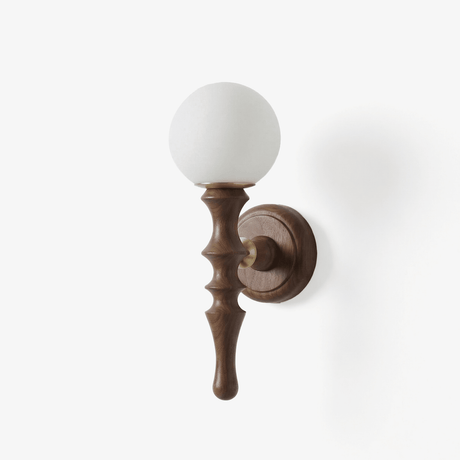 Orb wall sconce, a turned wood stem on a round plate carrying a white orb