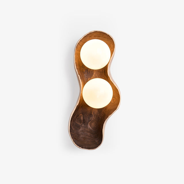 Orb wall sconce, two opal globes set in a carved two tone wood body