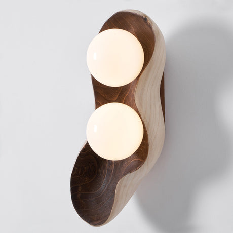 The two light version with both opal globes seated in the carved wood