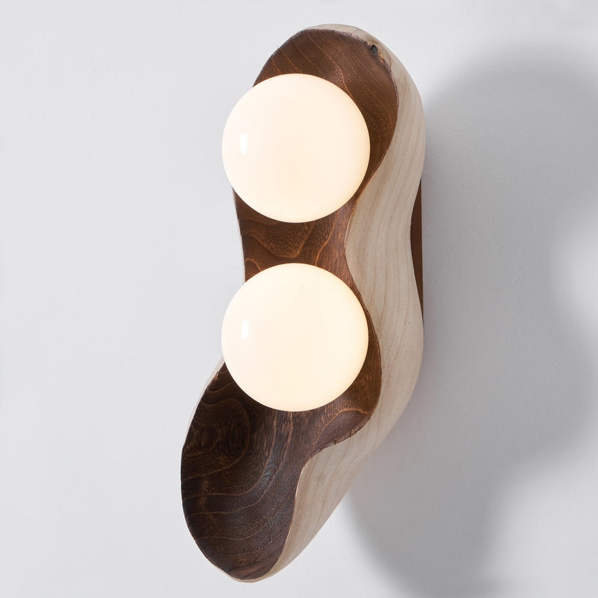 The two light version with both opal globes seated in the carved wood