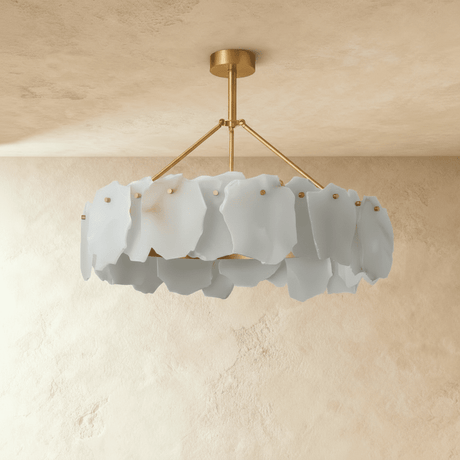 The same petal ring in a cooler gray stone against plaster