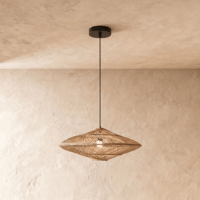 A flattened rattan shade woven into a wide diamond profile, lit from inside