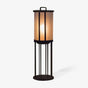 Frosted acrylic column lantern on a tall four leg floor stand in black