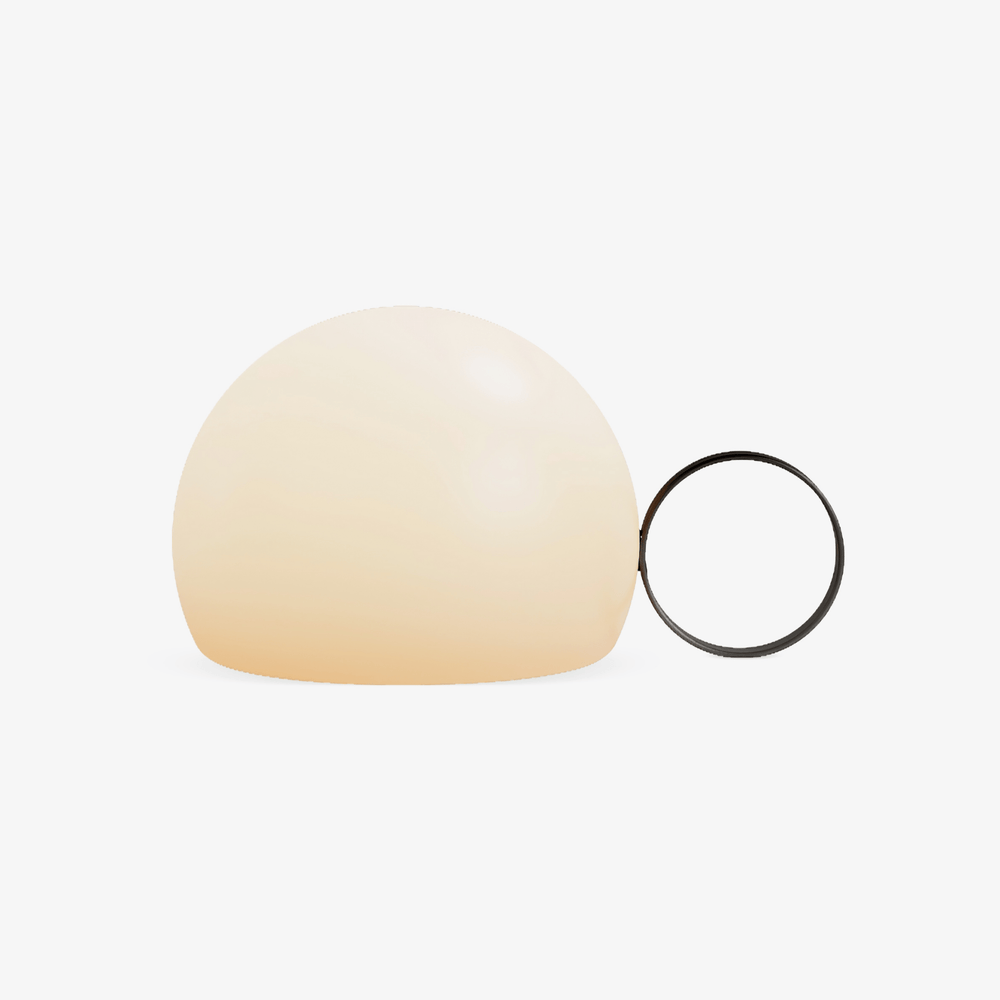 Opal dome lamp with a thin black ring handle on a plain background