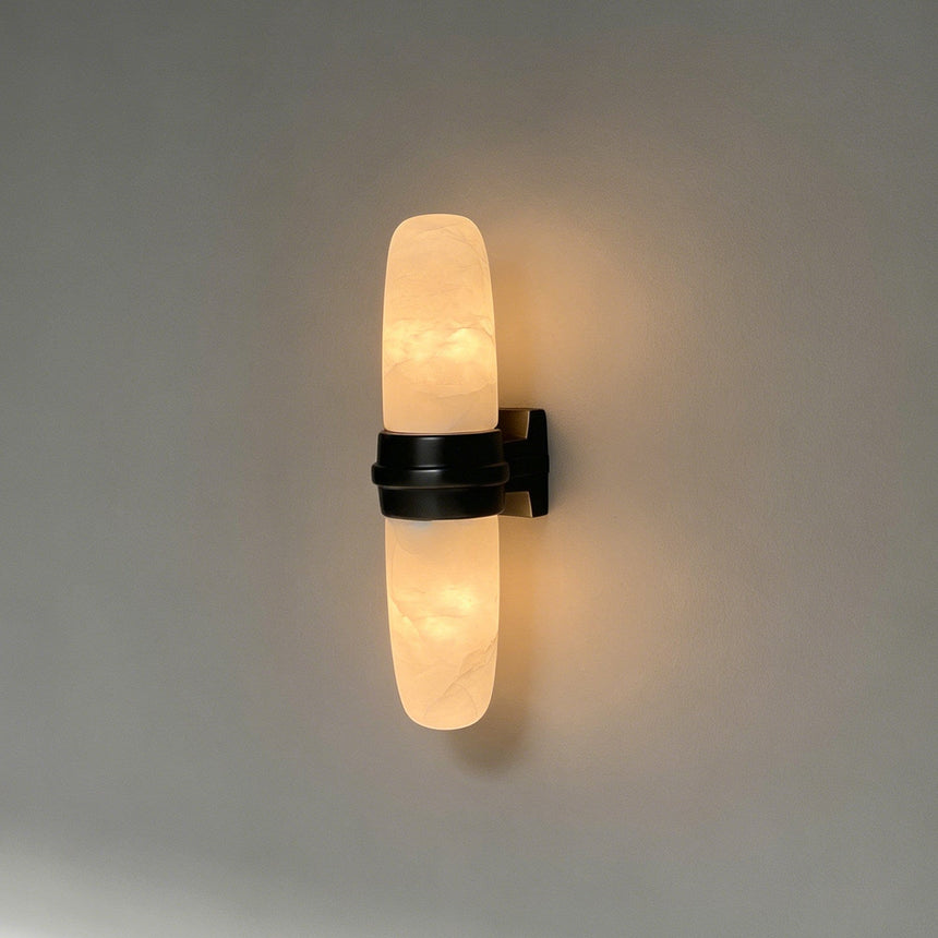 The matte black version with its lit tube on a pale background