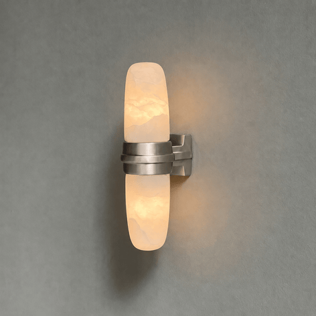 The brushed nickel version with its lit tube on a gray background