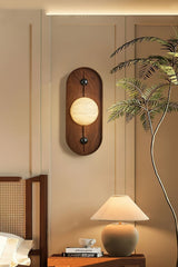 Wall sconce in stone and wood
