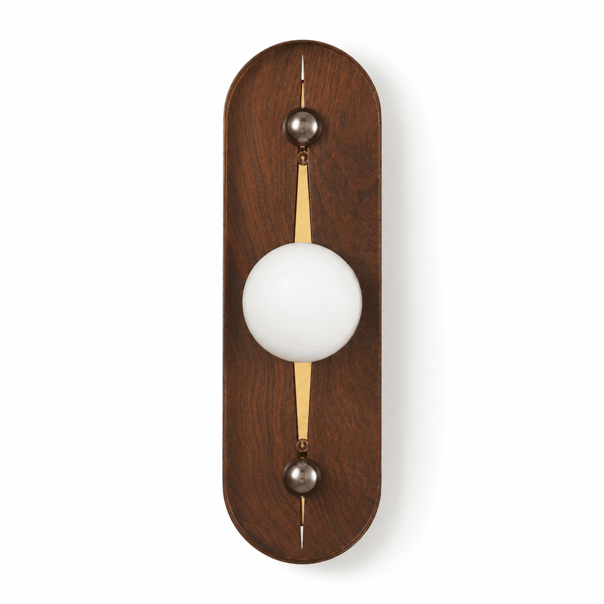 The walnut pill unlit, a pale sphere and a warm slot down the frame