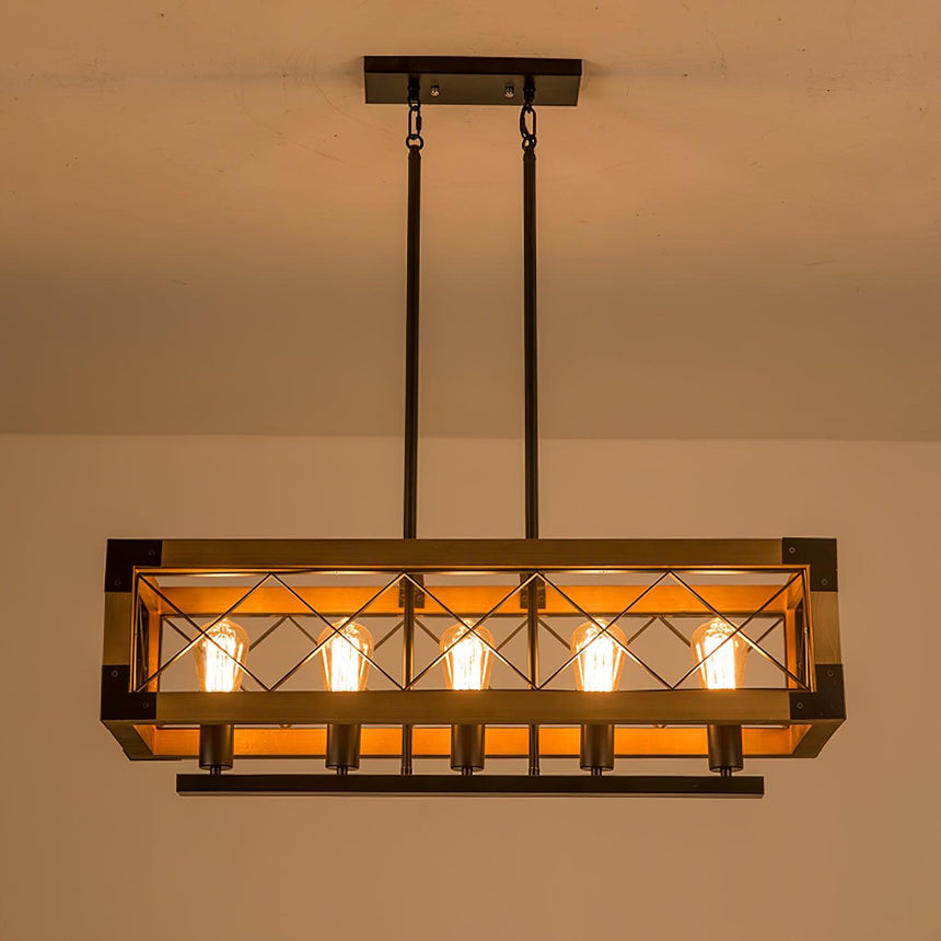 The long frame lit warm, the crossed braces reading against the lamps