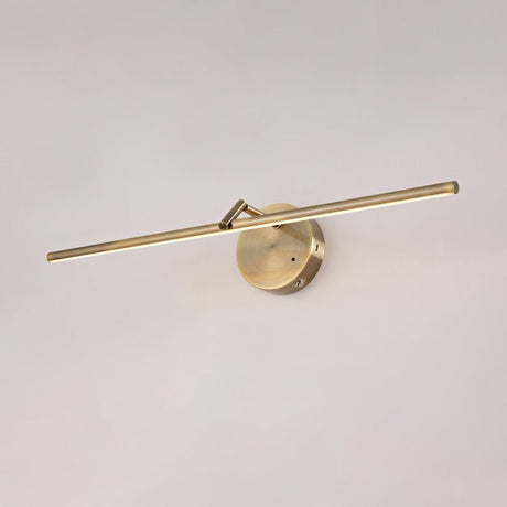 The bronze finish seen against a soft pink wall, rod and disc mount in profile