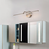 The nickel finish lit above a mirrored cabinet in a pale blue bathroom