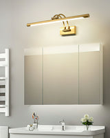 Brass bar lit above a wide mirror cabinet over a white basin in a pale bathroom
