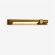 Slim bronze bar with a small square block at one end, seen level