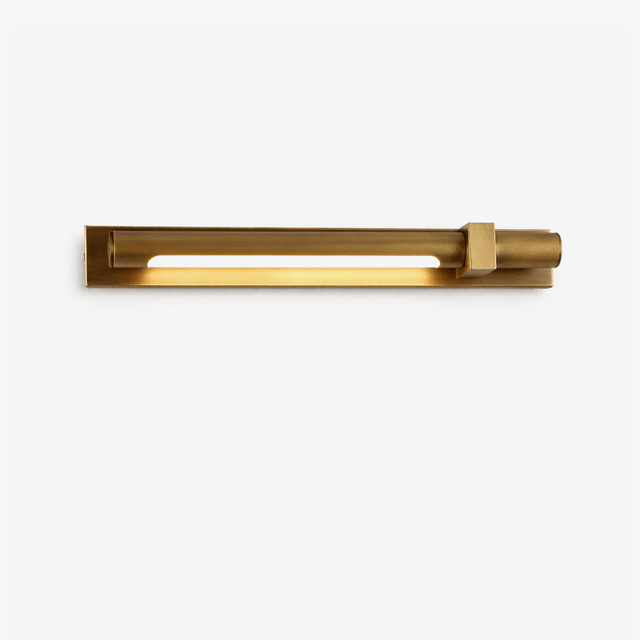 Slim bronze bar with a small square block at one end, seen level