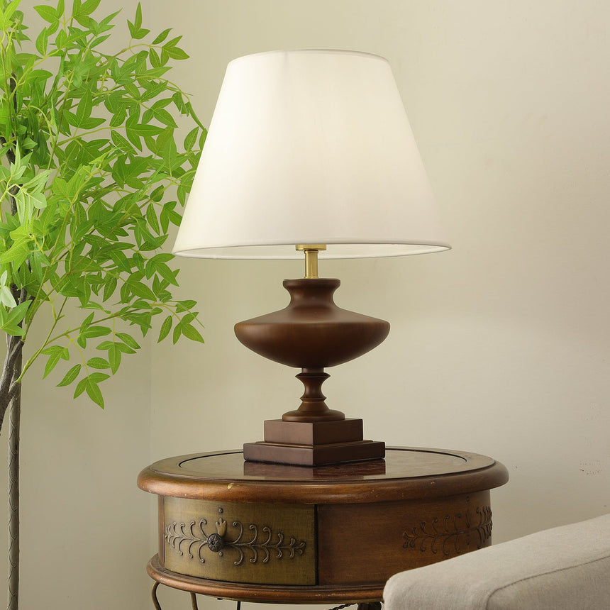 Walnut oversized table lamp seen from the front, urn base and plinth