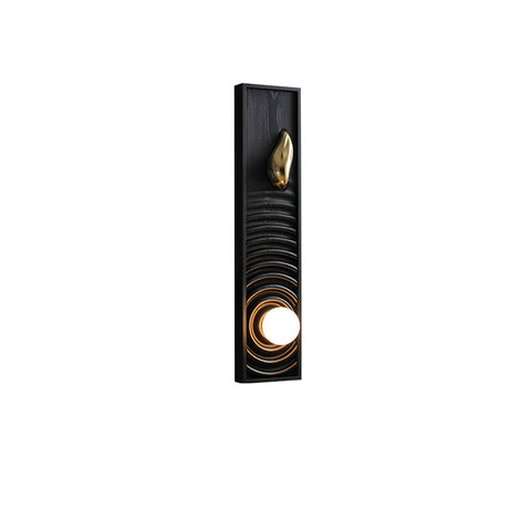 Black stained panel carved in ripples with a brass teardrop and a lit orb
