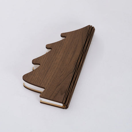 The lamp lying folded flat with the paper tiers pressed together