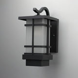 The lantern unlit on a gray background, showing the back plate