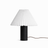 Pleated white shade on a black wood base against a plain white ground