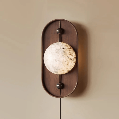 Close view of the translucent disc set in the middle of the walnut frame