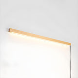 Pine bar lit and seen at an angle, showing how flat it sits on the wall