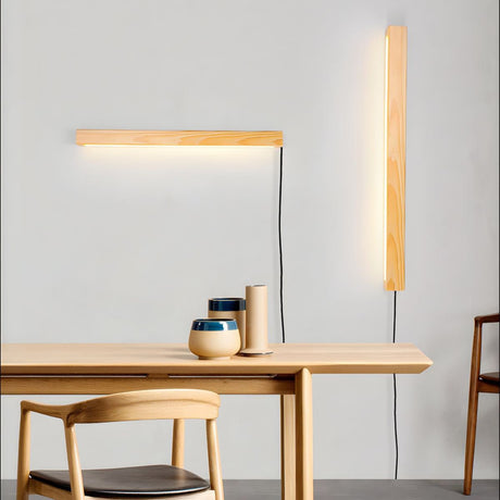 One bar horizontal and one vertical lit together above a table