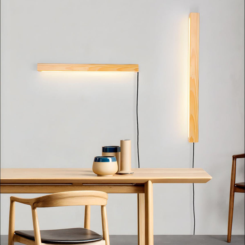 One bar horizontal and one vertical lit together above a table