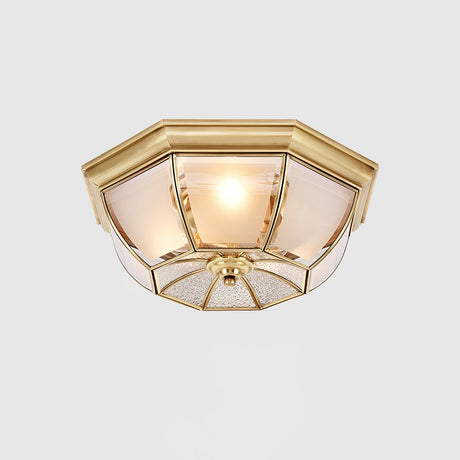 Octagonal brass ceiling light seen from the side, unlit