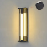 The solar version lit on a plain wall, a callout marking the cell on top