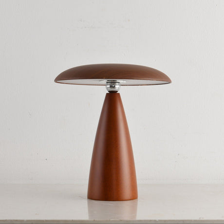 Portable table lamp on a straight cone base, seen from the front
