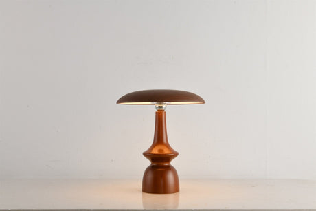 Portable table lamp on a turned spindle base, plain ground