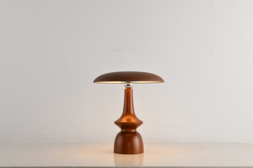 Portable table lamp on a turned spindle base, plain ground