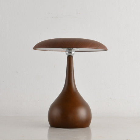 Portable table lamp on a teardrop base seen from the front