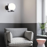 Modern wall sconce with slim stem
