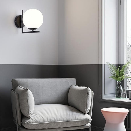 Modern wall sconce with slim stem