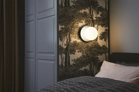 Globe Ceiling Light Mounted Above Bathroom Mirror