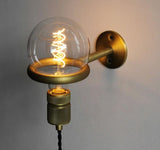 Plug-in wall light for cafes and studios