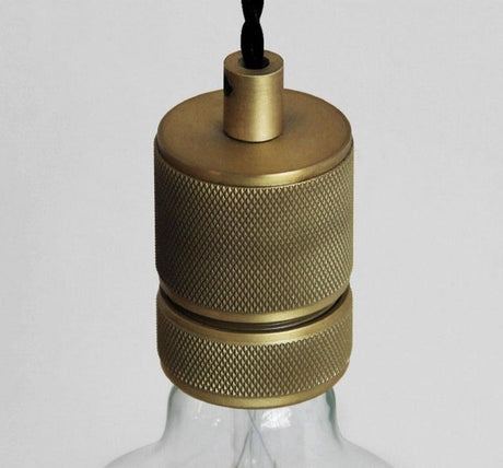 Brushed metal detail on wall sconce