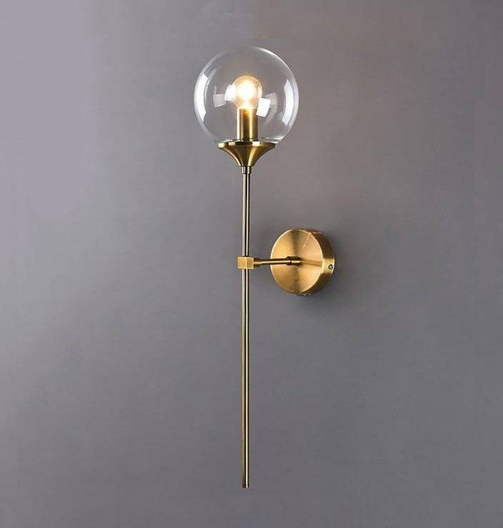 Brushed brass finish close-up on wall lamp