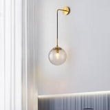 Gold and black wall light fixture
