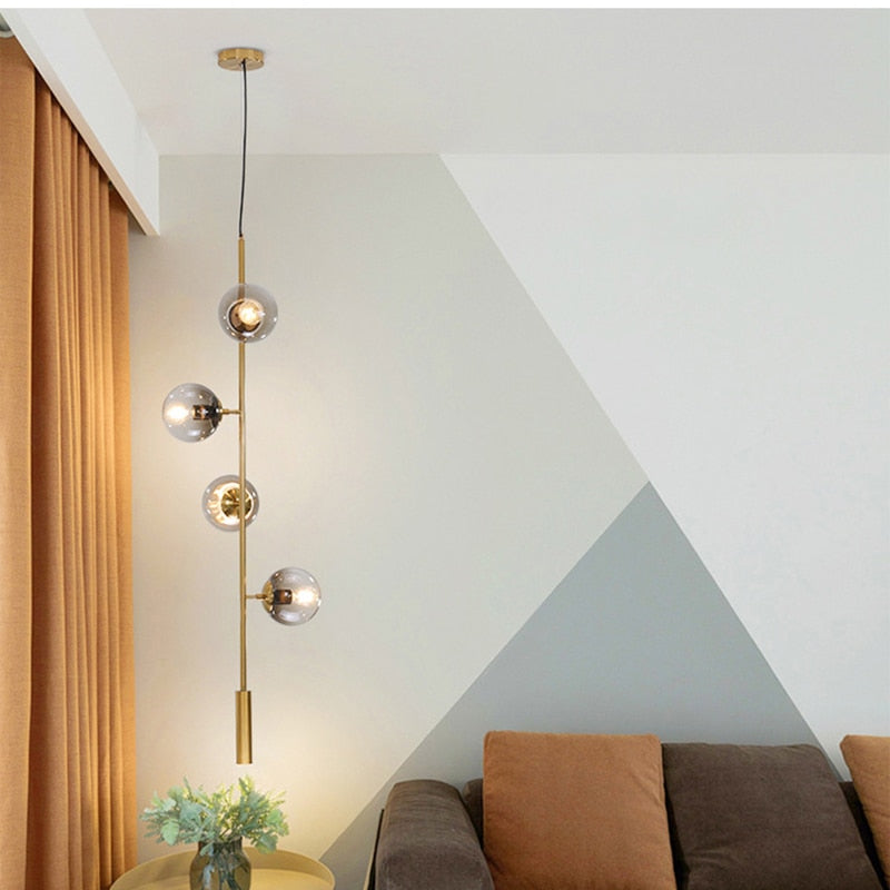 Solara Six-Sphere Amber Glass Pendant Light with Gold Rods
