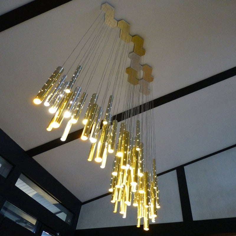 Gold Chandelier Installed Above Dining Table