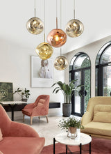 Colorful Pendant Light Installed Above Dining Table