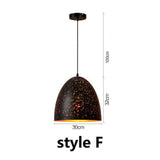 Starry pendant light hanging over dining table