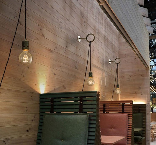 Exposed bulb wall sconce for bedroom