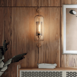 Glass and metal wall lamp with warm LED ambient glow for living room