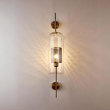 Wall mounted lamp with shade directing light upward and downward